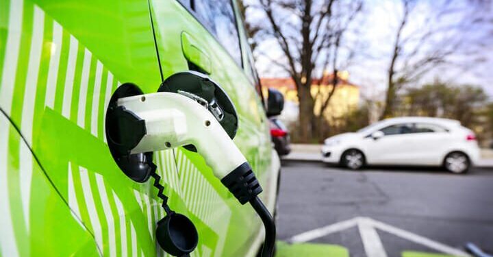 Theresa May to pledge £106m for UK to lead in EV tech
