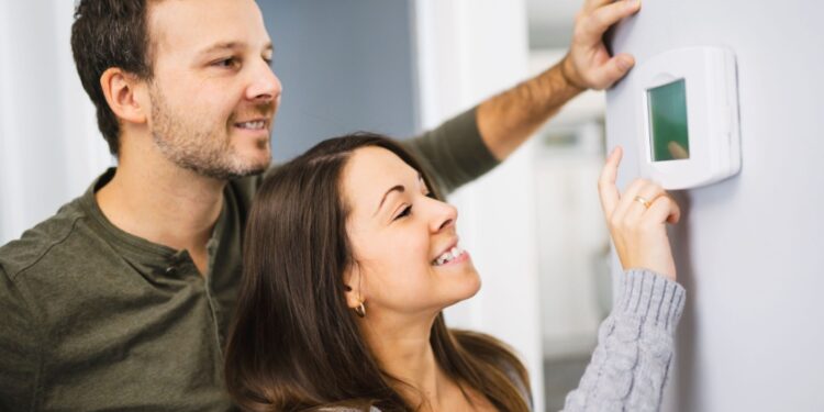 Women win the battle of the thermostat dial